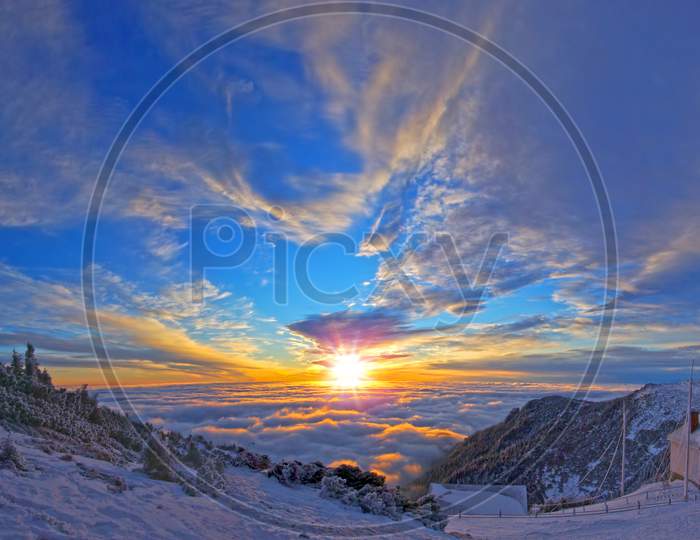 Sunrise Landscape On Winter Mountain