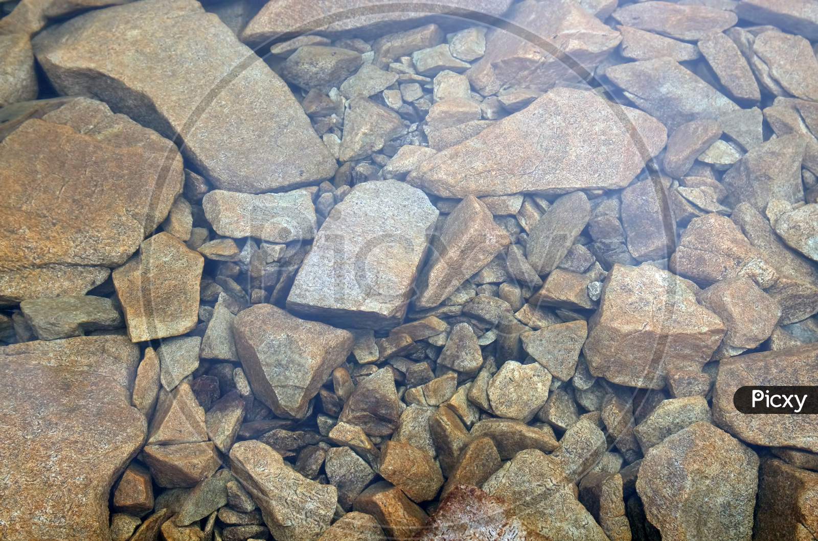Stones Under The Clear Water Of Lake