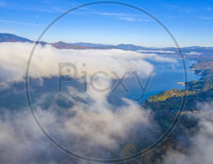 Cloud Of Mist Over Mountain Lake