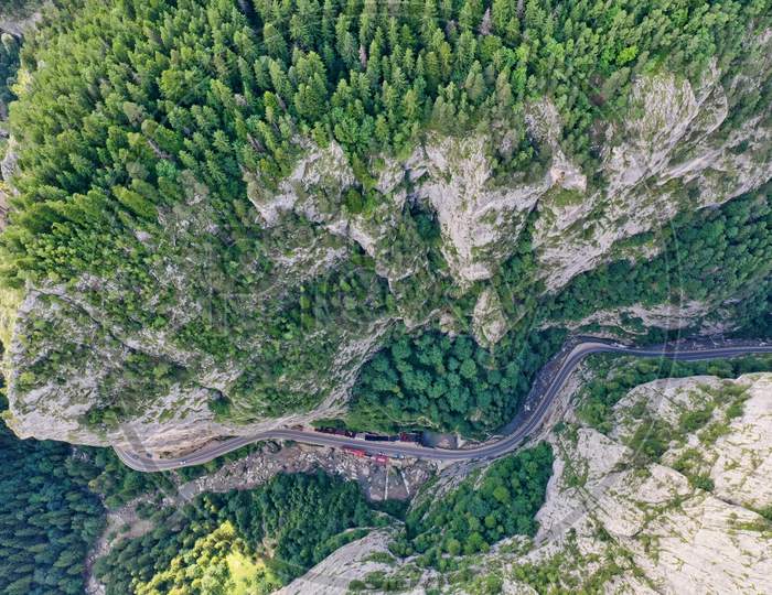 Winding Road In Mountain Canyon From Above