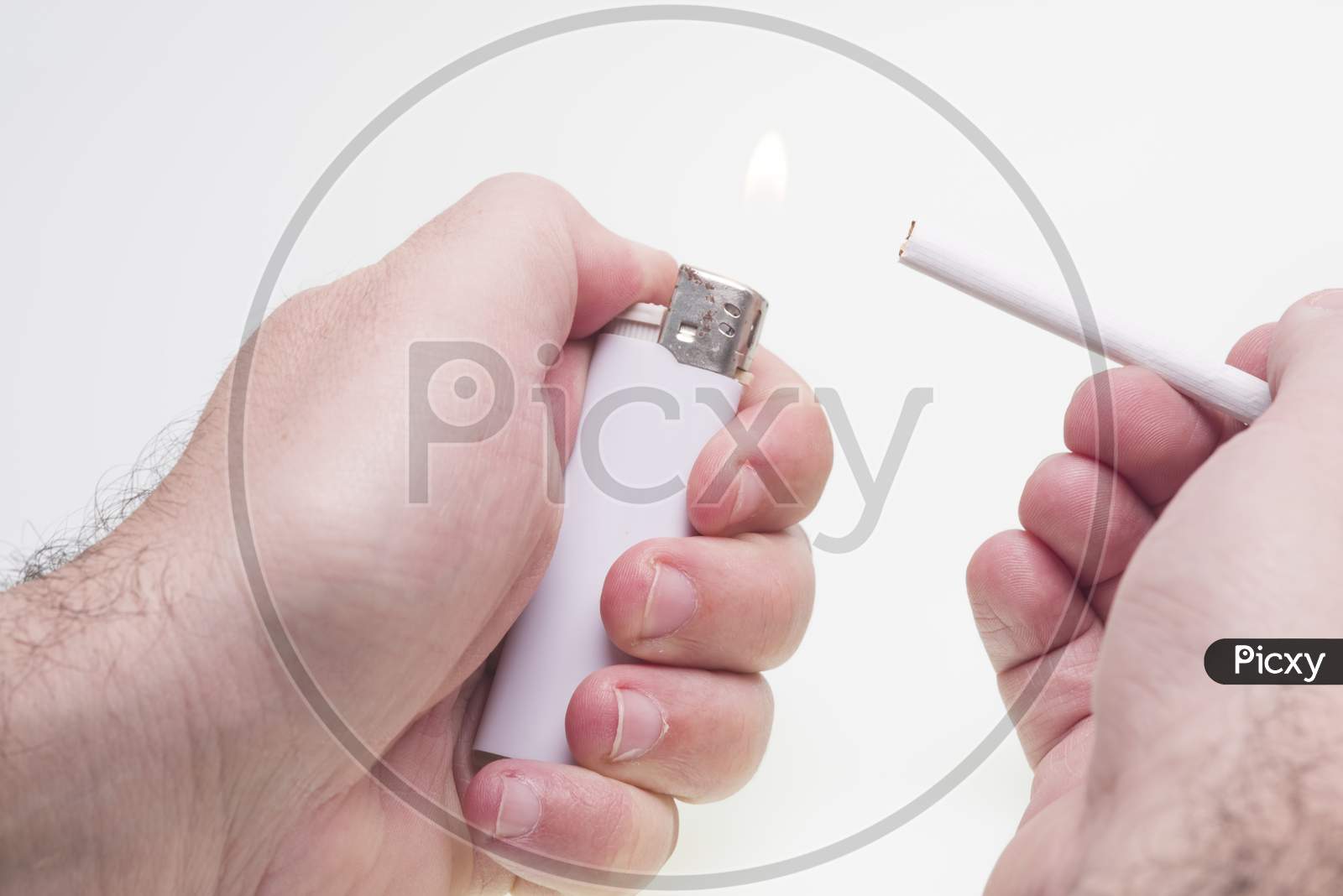 Man Lights A Cigarette