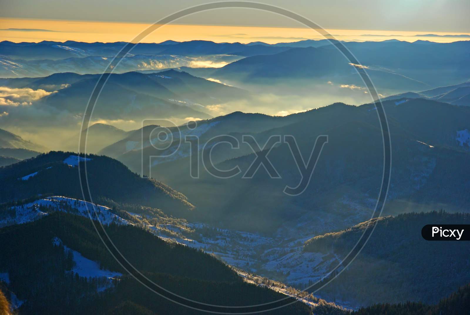 Misty Mountain Landscape From The Top