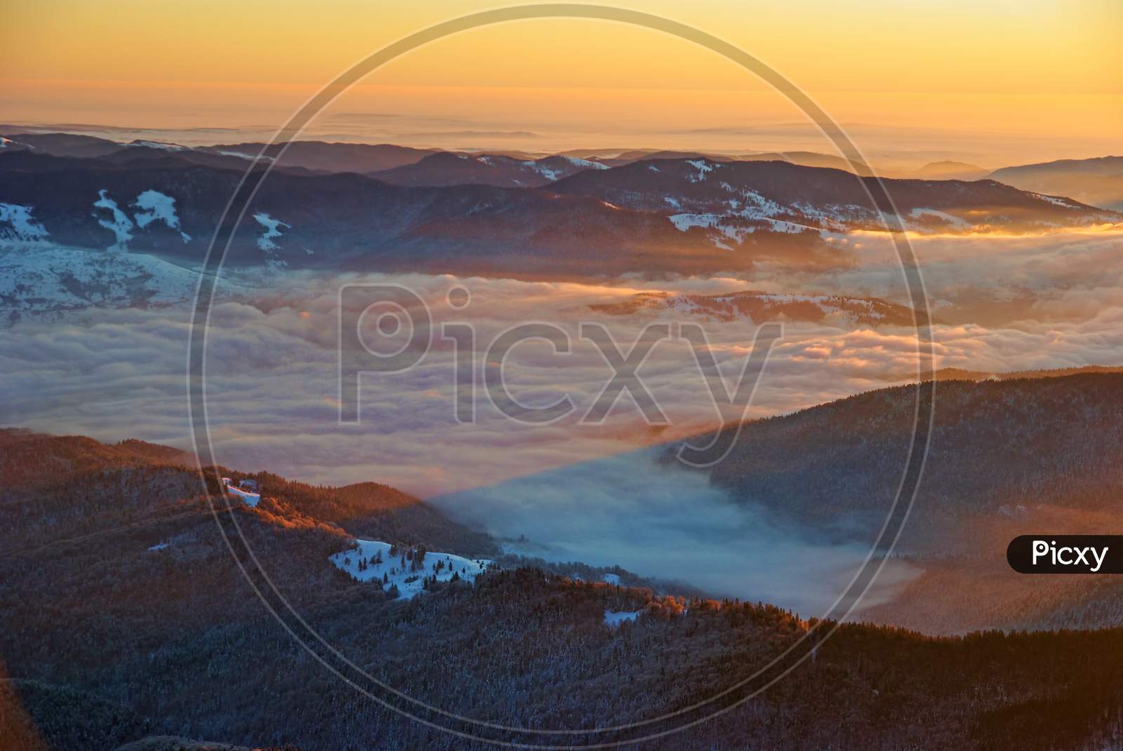 Sunrise From The Summit In Winter