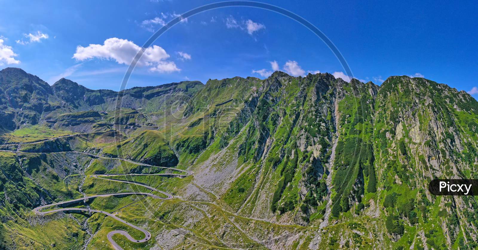 Summer Landscape In Fagaras Mountains, Green Crest And Mountain Road