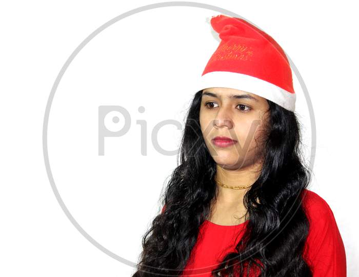 Women with Christmas hat expressing