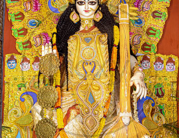 Goddess Saraswati Idol Decorated At Puja Pandal, Saraswati Symbolizes Creative Energy And Is Considered As The Goddess Of Knowledge, Music, Art, Wisdom, And Learning.