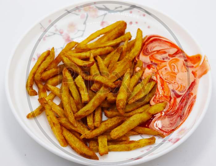 French Fries Stock With Sauce On Plate