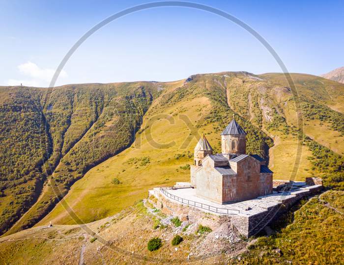 Aerial View Of Gergeti Trinity Church On The Hill With No Tourist. Kazbegi