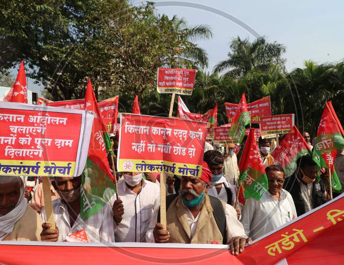Farmers and members of various agricultural organisations shout slogans during a protest against new farm laws passed by India's parliament, in Mumbai, India, December, 2020.