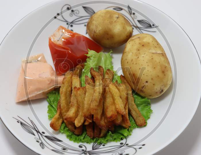 French Fries Stock With Sauce And Potato And Lettuce