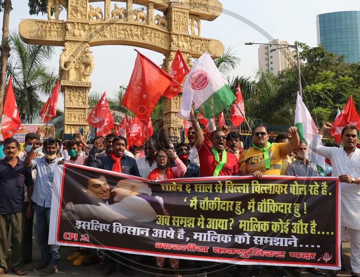 Farmers and members of various agricultural organisations shout slogans during a protest against new farm laws passed by India's parliament, in Mumbai, India, December, 2020.