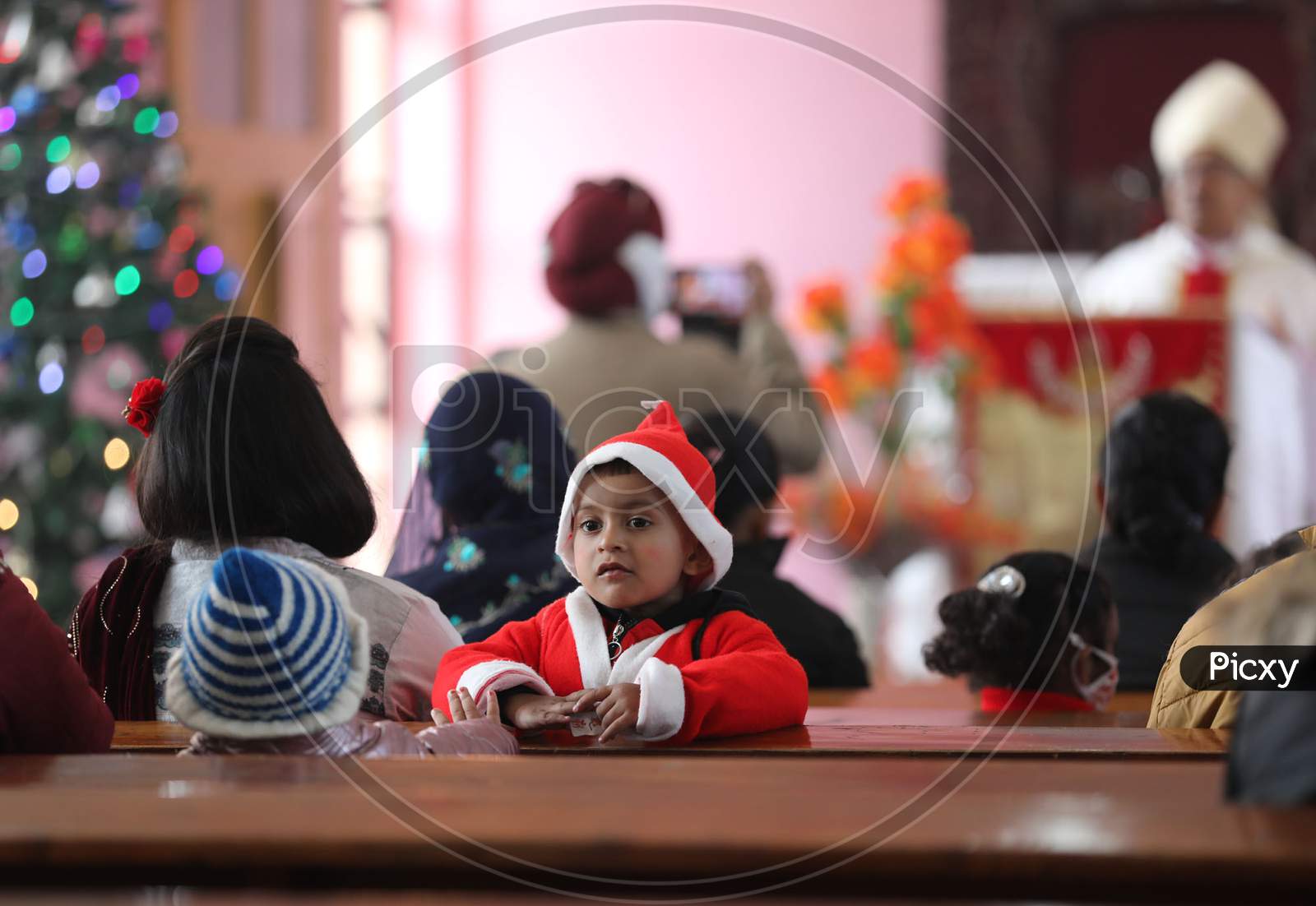 Christian offers Christmas prayers at a church in Jammu, 25 December 2020.