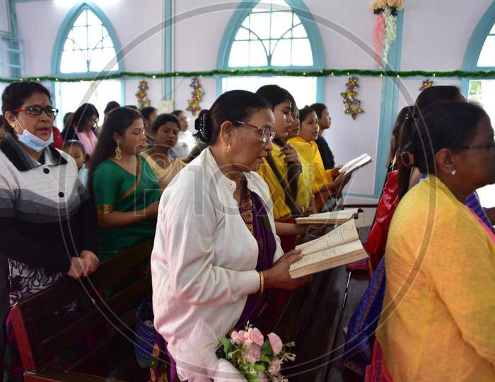 Devotees attends Christmas prayers at  a church in  Assam on Dec 25,2020