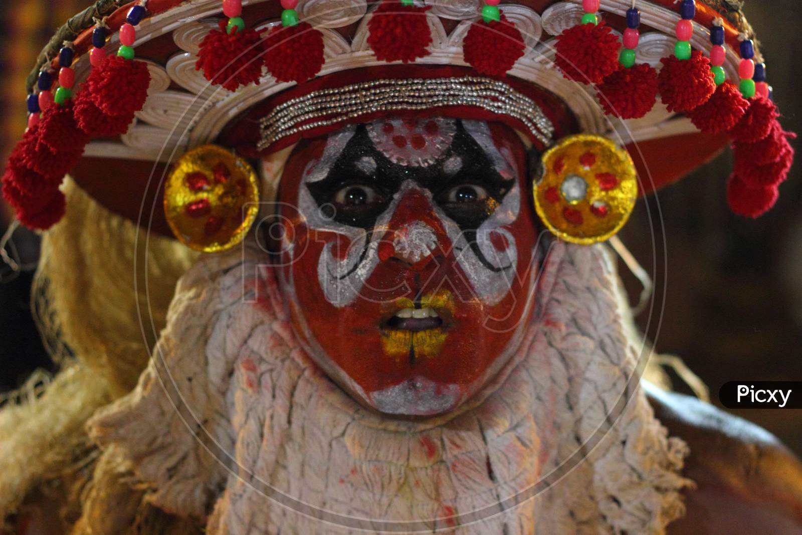 Close up of a theyyam artist