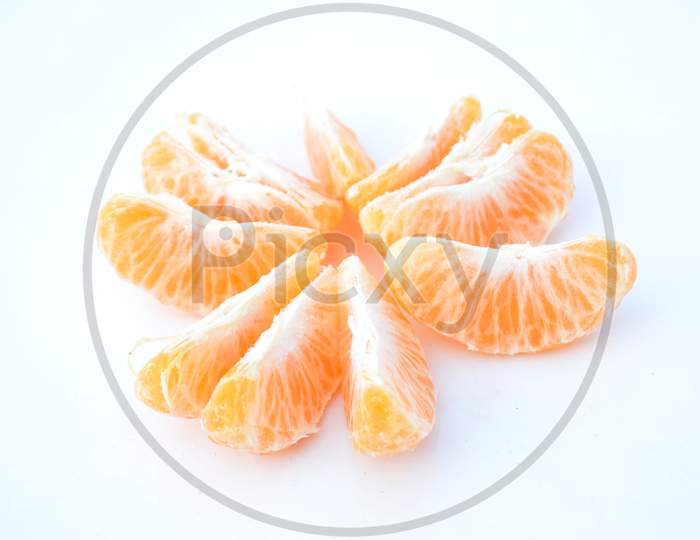 The Ripe Yellow Peels Orange Isolated On White Background.