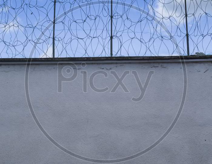 Prison Wall And Wire Fence