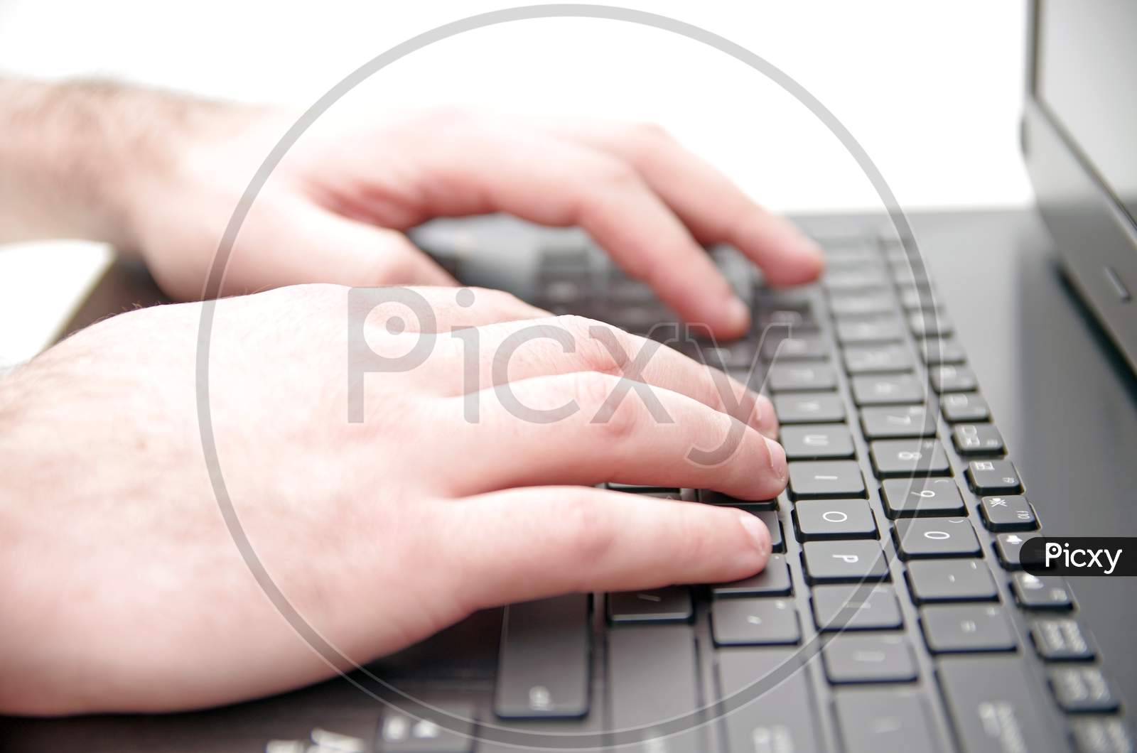 Hand On Laptop Keyboard