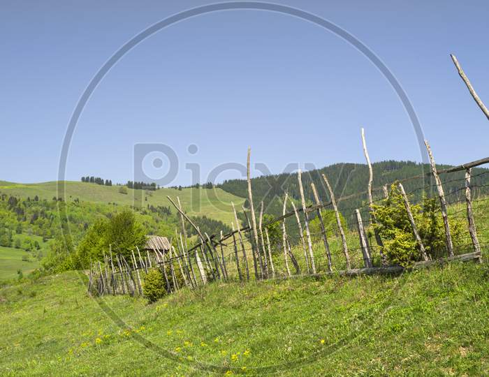 Fence In Rural Landscape