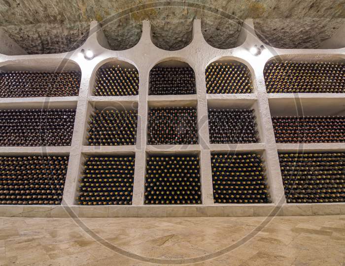 Wine Bottle Wall In Winery