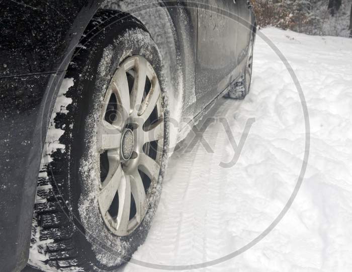Car Tires On Winter Road
