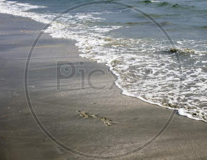 Wave On Sand