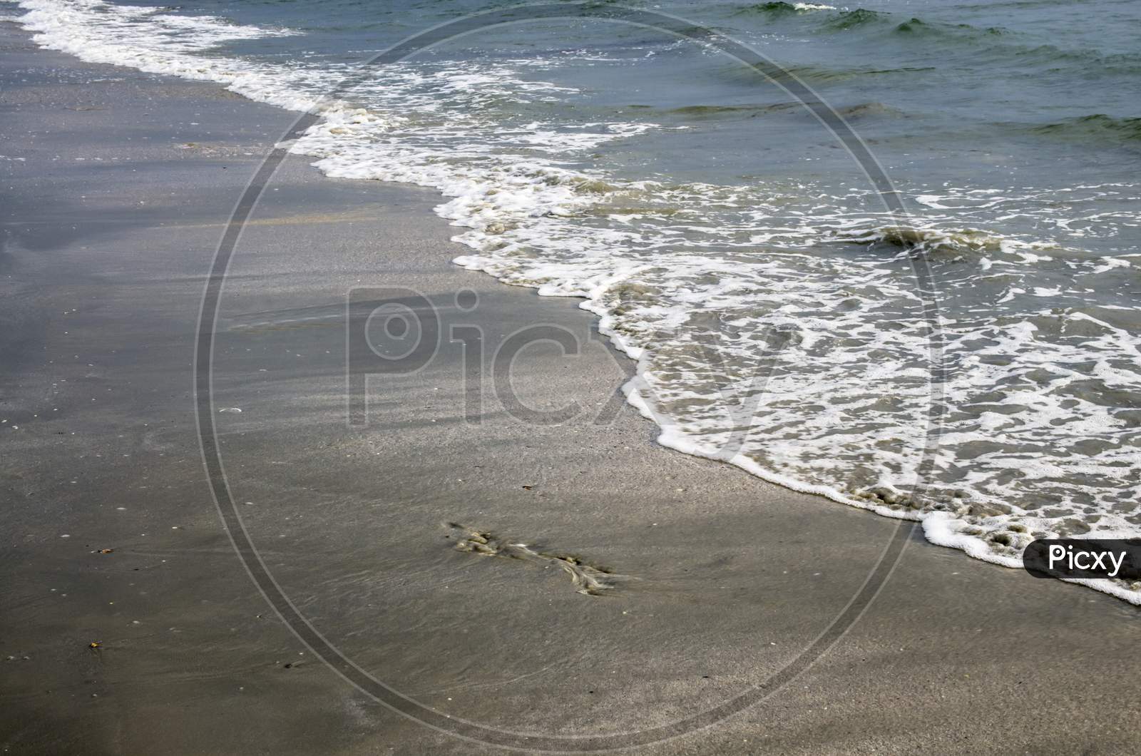 Wave On Sand