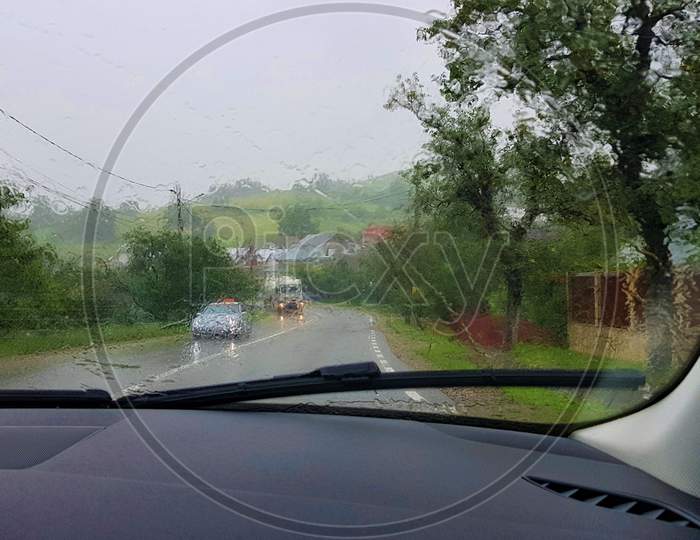 Car Driving In Rain