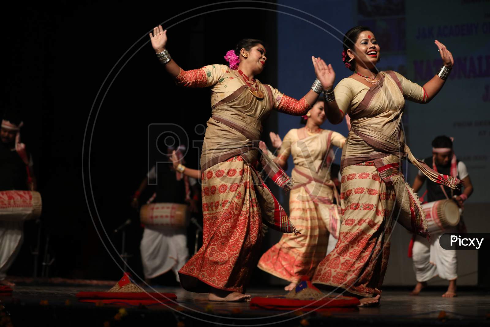Artists performing during National folk danceat Abhinav theater in Jammu,27 Dec,2020.