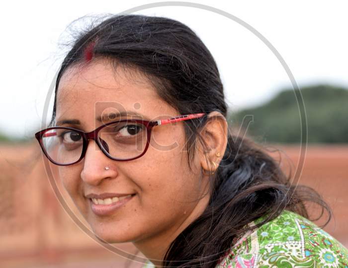 Portrait of an Indian woman wearing spectacles
