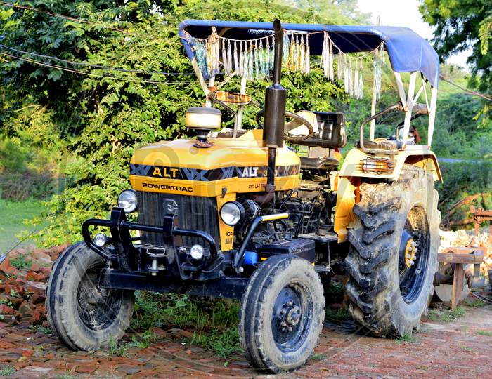 A Yellow Color Alt Anti Lift Tractor Manufactured By Escorts India