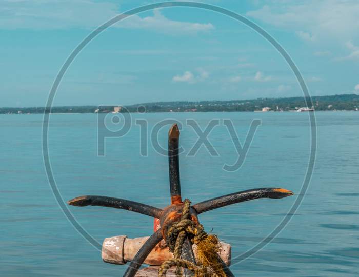 Wooden Sailboat On The Clear Water Of Zanzibar Island