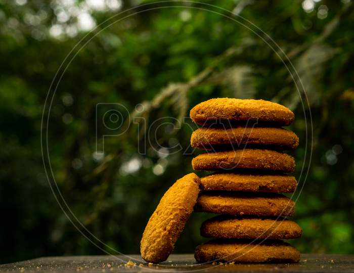 Sweet Cookies Stacked Together On A Table