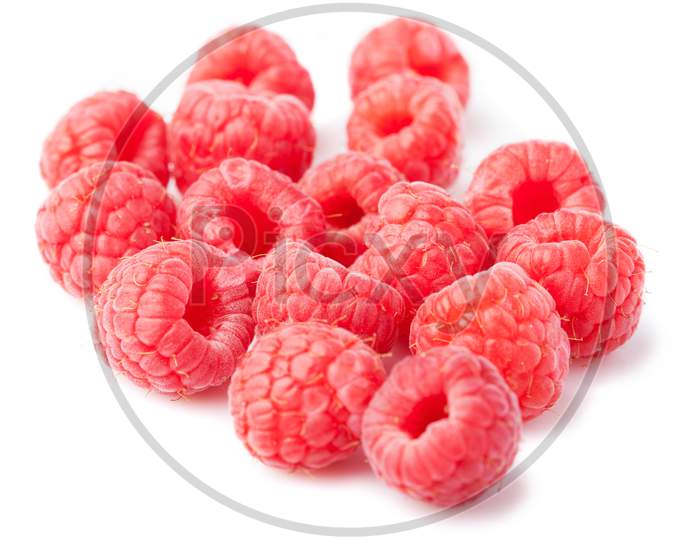 Group Of Raspberries Isolated On A White Background