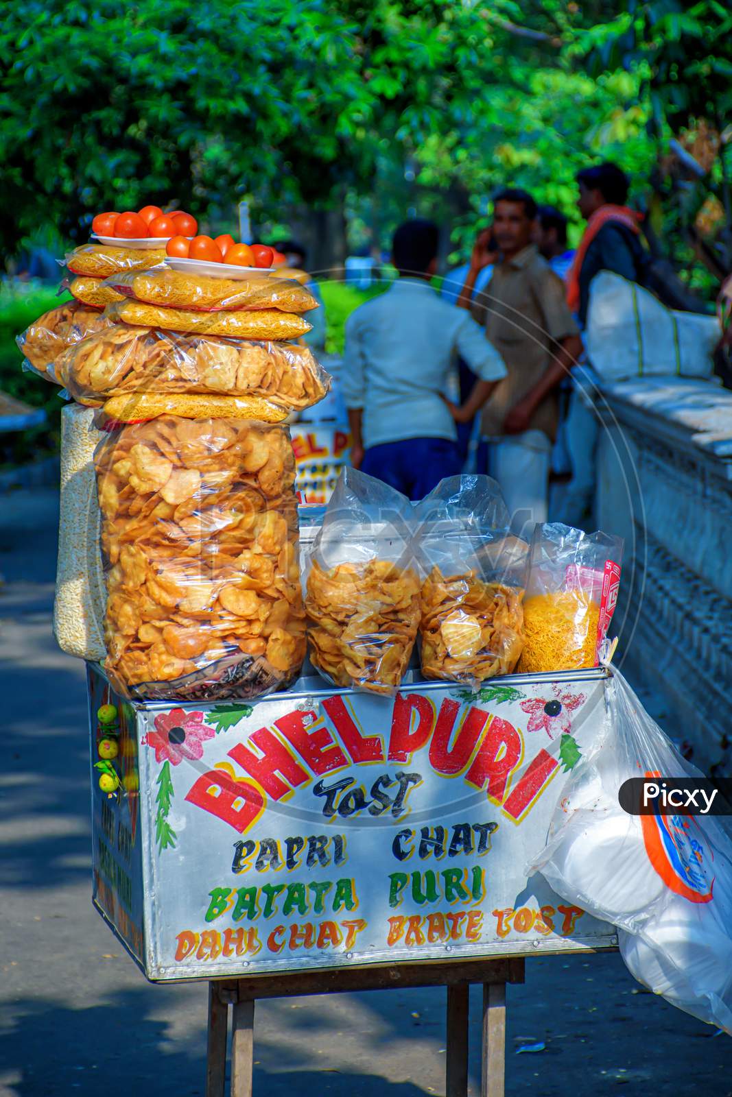 Papri Chat, Bhel Puri And Wide Variety Of Chats Being Sold By A Fast Food Vendor In His Cart Beside A Road In Kolkata, India On May 2019