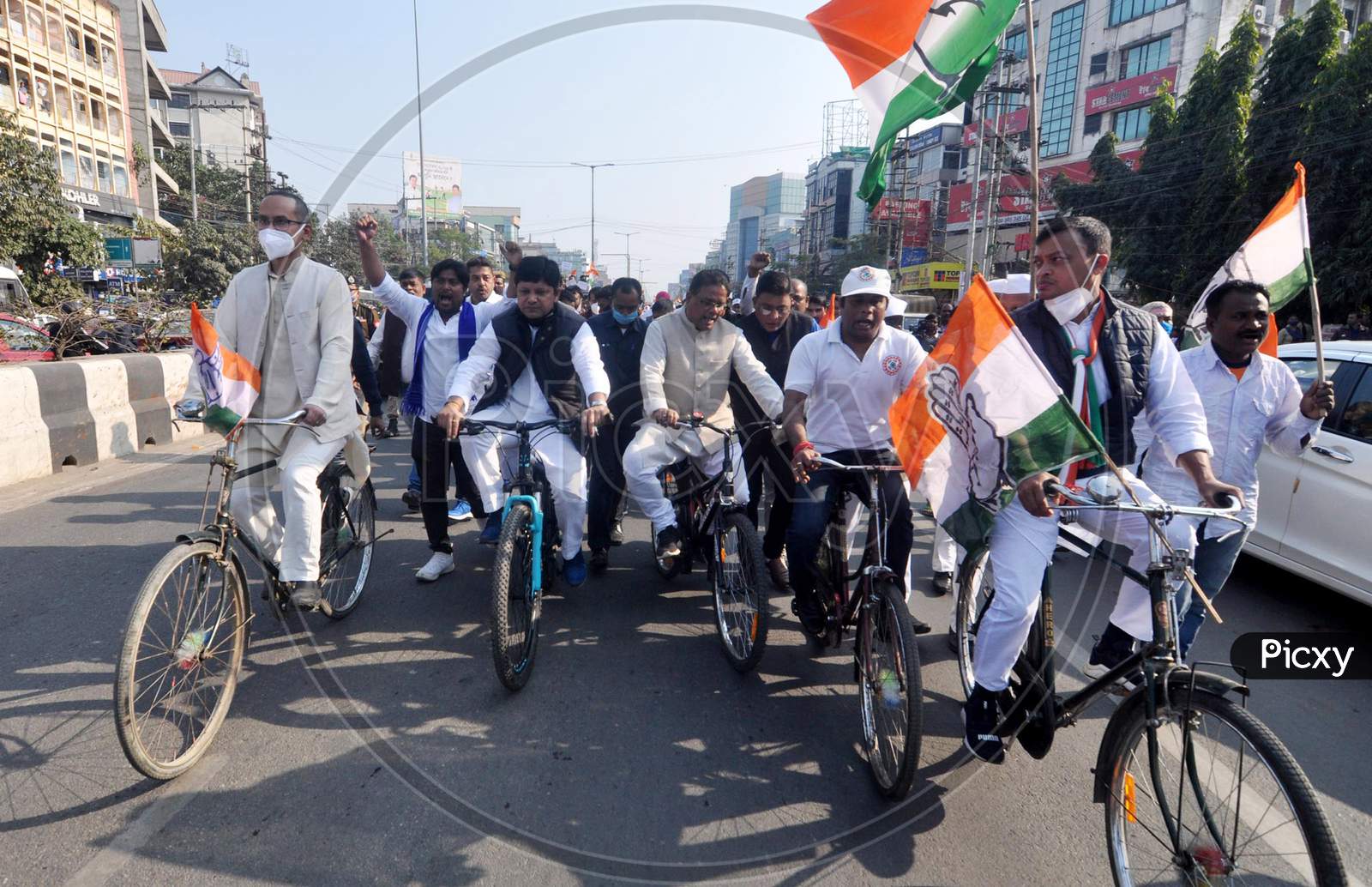 MP Gaurav Gogoi, Assam Pradesh Congress Chief Ripun Bora, and senior party leaders take part in a protest rally against fuel price hike, in Guwahati, Monday, Dec. 28, 2020.