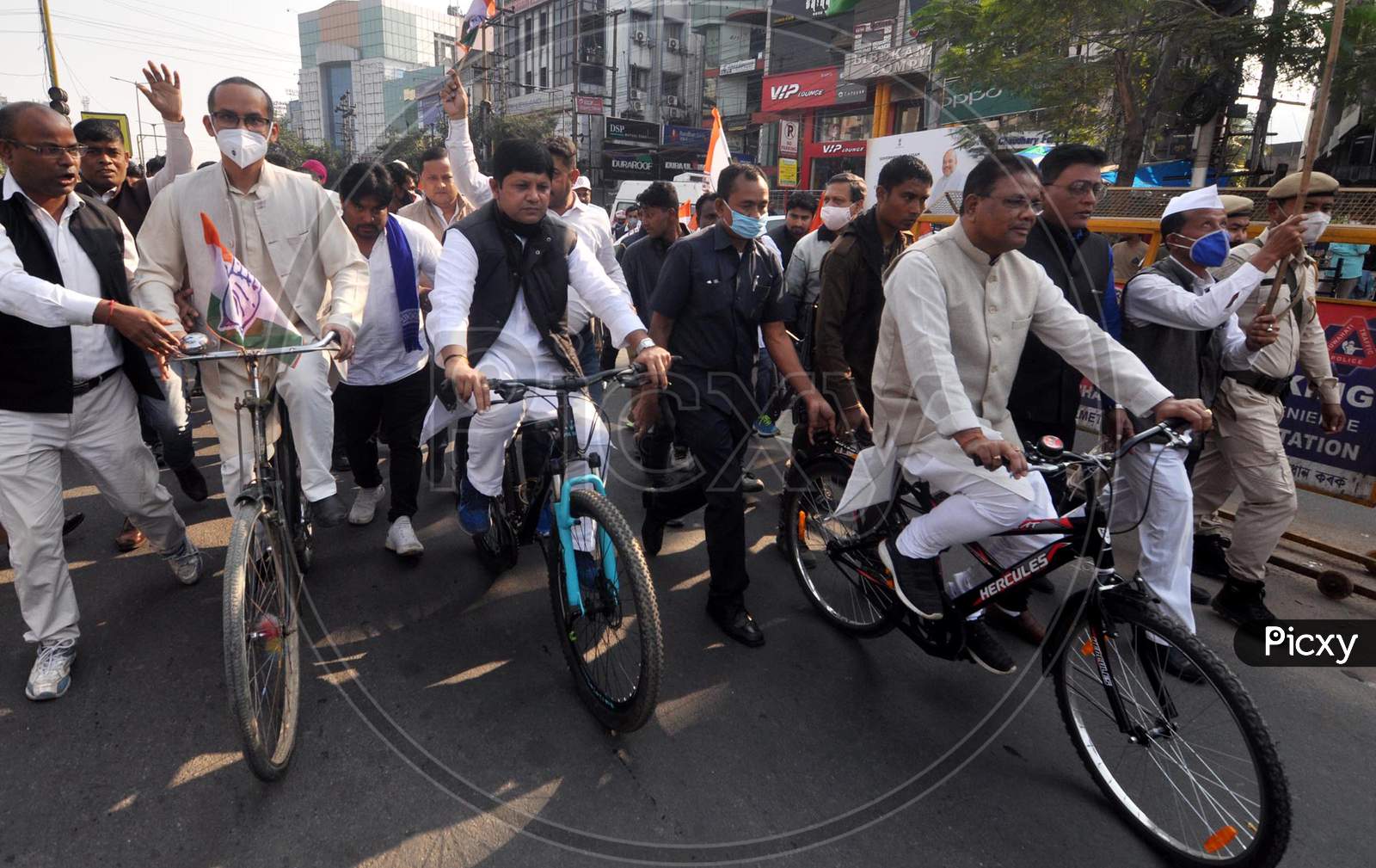 MP Gaurav Gogoi, Assam Pradesh Congress Chief Ripun Bora, and senior party leaders take part in a protest rally against fuel price hike, in Guwahati, Monday, Dec. 28, 2020.