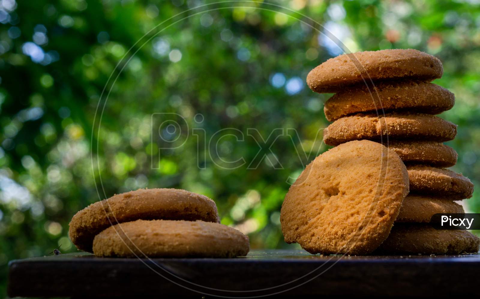 Sweet Cookies Stacked Together On A Table