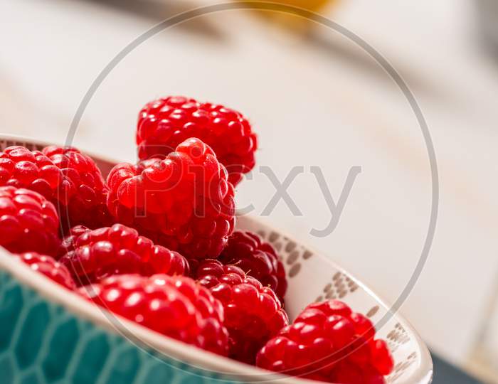 Close Up Of Bowl Of Raspberries
