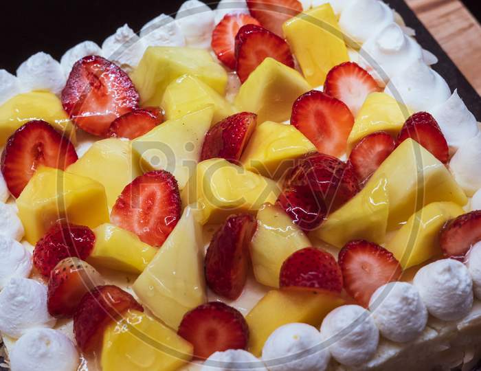 Strawberry And Pineapple Mixed With Whipped Cream
