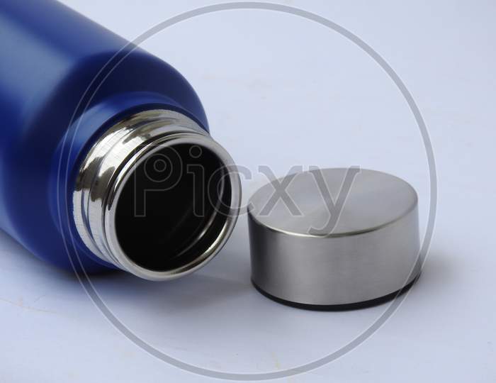 Blue Color Steel Water Bottle with Cap Open and Closed with Base isolated on white background