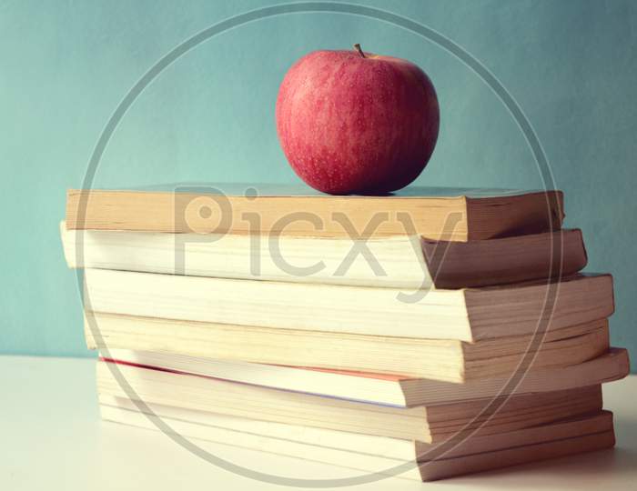 The Stack of book with Apple