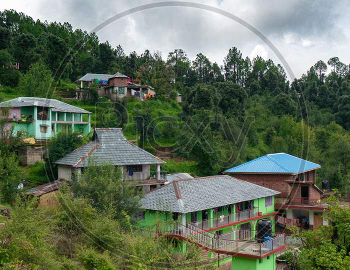 Large Concrete Buildings Of Hotels Homestays And Residences In Hill Stations In India Like Shimla, Dharamshala, Nainital And More Which Are Popular Tourist Vacation And Work Remotely Destinations