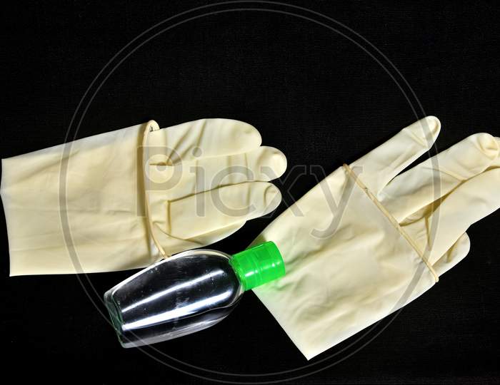 Human holding Variation of Latex Glove, Rubber glove manufacturing, human hand is wearing a medical glove, glove, isolated