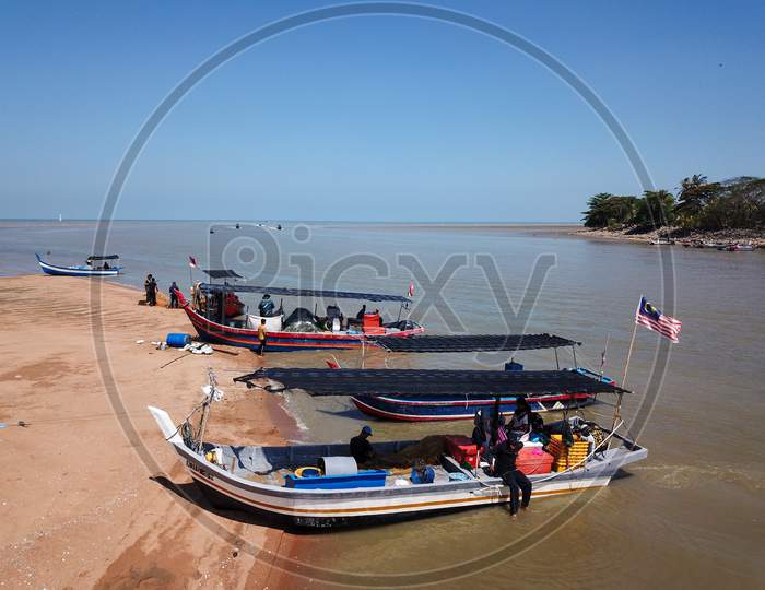 A Boat With Malaysia Flag Park At Coastal