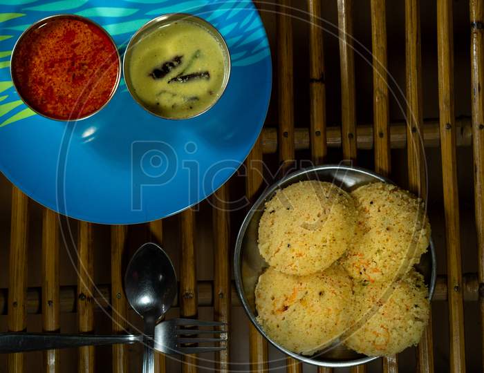 Homemade Tasty Rava Idly In A Plate Along With Chutney And Curry