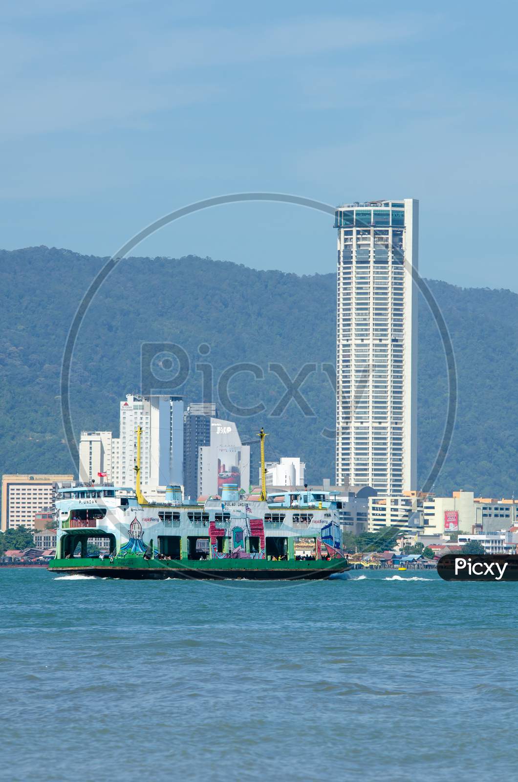 Ferry Move At Penang Sea