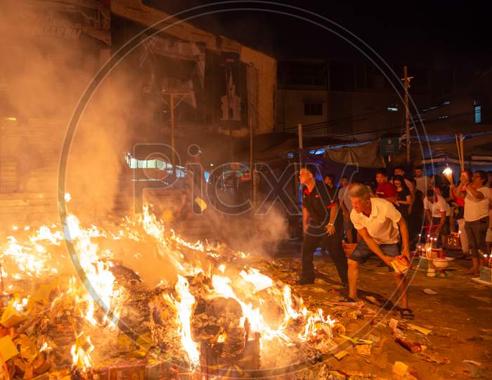 Paper Effigy Is Burnt On The Last Day Of The Hungry Ghost Festival