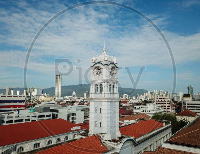 Clock Tower At Malayan Railway Building With Background Komtar Tower