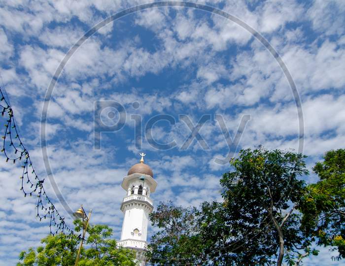 Minaret Kapitan Keling Mosque Under Blue Sky
