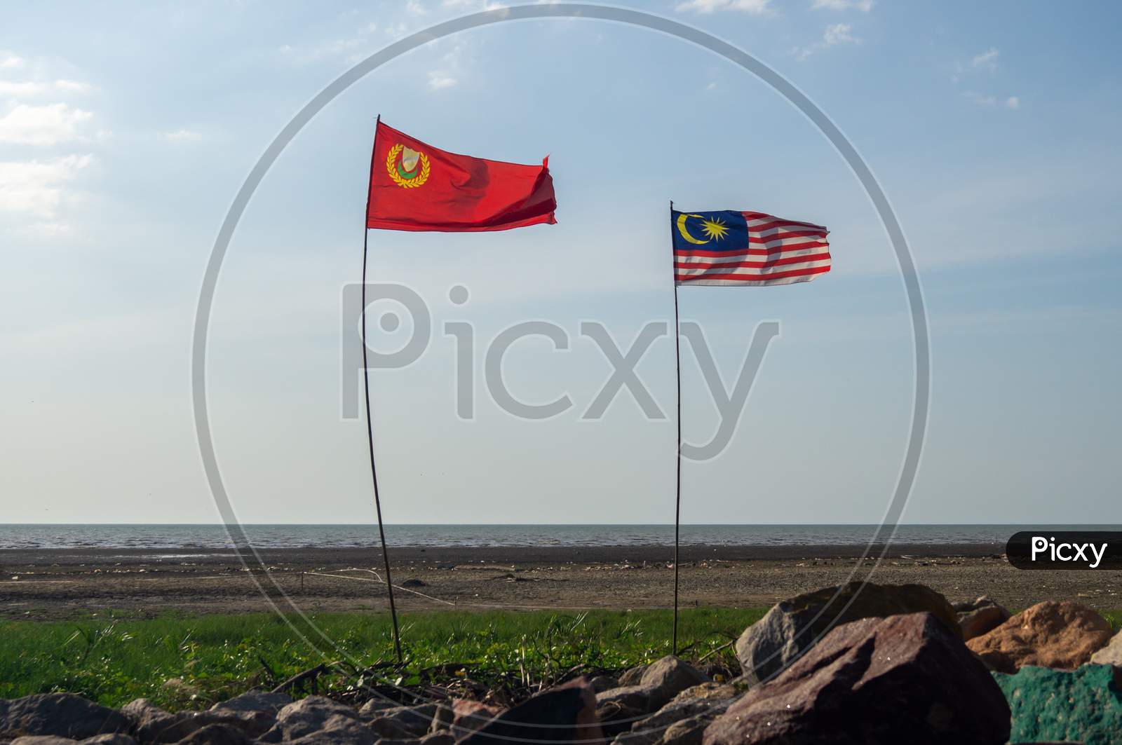 Malaysia And Kedah Flag Waving Near Outdoor